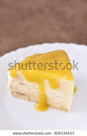 Crepe cake with lemon syrup