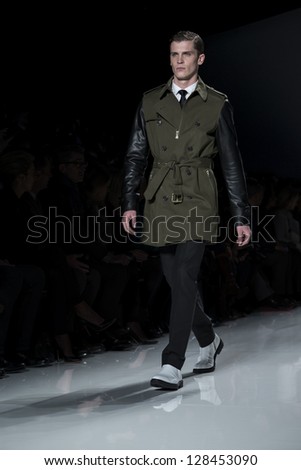 NEW YORK - FEBRUARY 13: A model is walking the runway at Michael Kors Collection for Fall/Winter 2013 during Mercedes-Benz Fashion Week on February 13, 2013 in New York