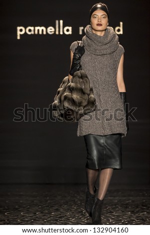 NEW YORK - FEBRUARY 11: A model is walking the runaway at Pamella Roland Show for Fall/Winter 2013 Collection during Mercedes-Benz Fashion Week on February 11, 2013 in New York