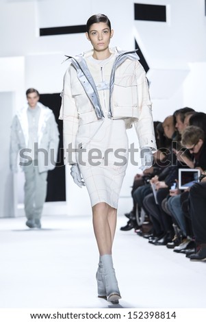 NEW YORK - FEBRUARY 09: A model is walking the runaway at Lacoste Ready to Wear Fall/Winter 2013-2014 fashion show during Mercedes-Benz Fashion Week on February 09, 2013 in New York