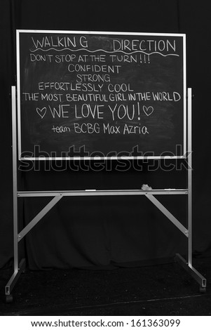 NEW YORK - SEPTEMBER 05: A backstage chalk board with directions at the BCBG Max Azria Spring 2014 fashion show during Mercedes-Benz Fashion Week at Lincoln Center on SEPTEMBER 05, 2013 in New York