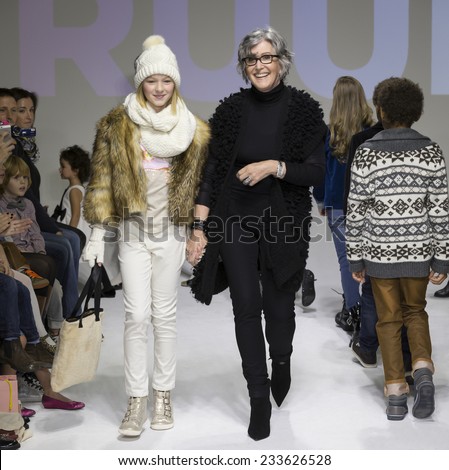 NEW YORK, NY - OCTOBER 19: Designer Nina Miner walks the runway with Ekaterina during the Ruum preview at petitePARADE - Kids Fashion Week at Bathhouse Studios