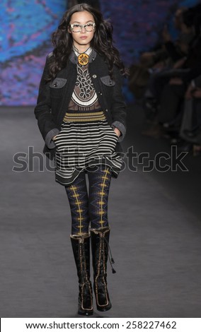 NEW YORK, NY - FEBRURY 18, 2015: Xiao Wen Ju walks the runway at Anna Sui Fall 2015 Collection at The Theater at Lincoln Center