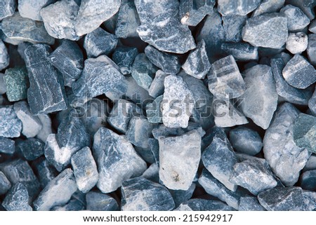 macro texture isolated crushed gray stone in natural lighting