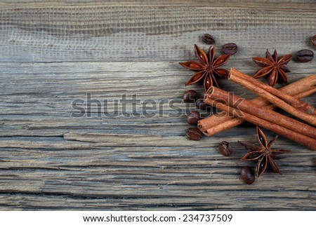 close-up still-life of cinnamon, star anise and coffe on magic Christmas holiday on background wooden boards studio