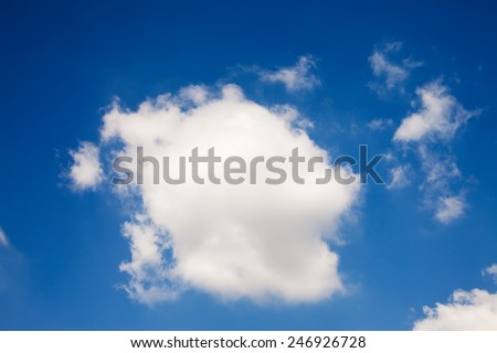 isolated closeup air white clouds on blue sky in sunny summer day