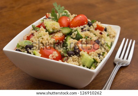 Quinoa salad with fresh vegetables and black beans