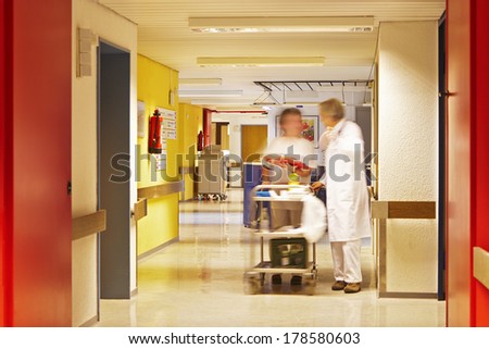 Corridor in hospital with nurse team