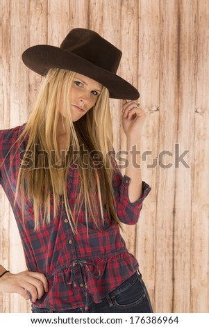 female cowgirl model wearing felt cowboy hat