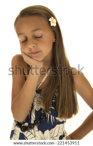 adorable tan girl wearing island dress dreaming