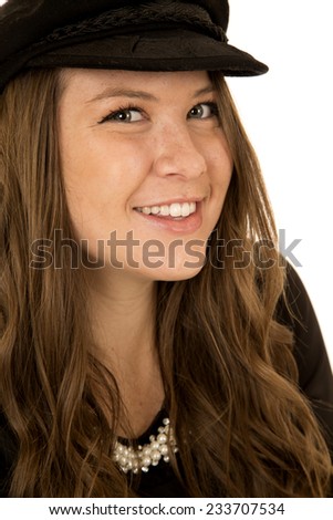 Close-up woman wearing black hat glancing sideways
