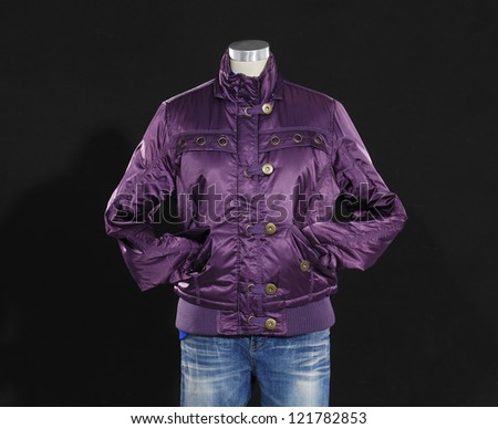 female clothing in jeans with coat mannequin-black background