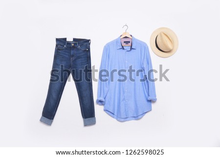 long sleeve blue shirt on hanging with blue jeans and hat 
 Stock fotó © 