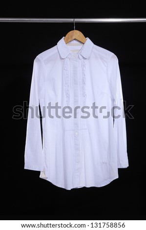 Woman white shirt clothes on a hanger isolated