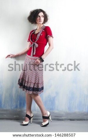 Full length beautiful casual young woman standing posing