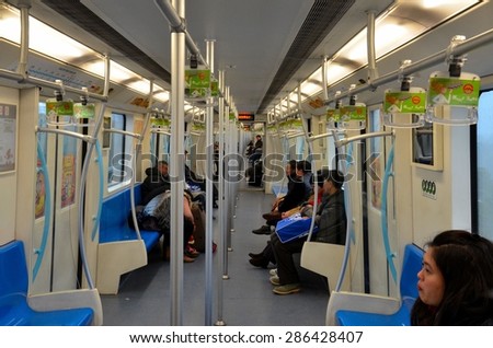 Shanghai, China - February 14, 2013: A train carriage of the Shanghai metro. The metro has grown rapidly in recent years to cater to the city\'s population of over 20 million.
