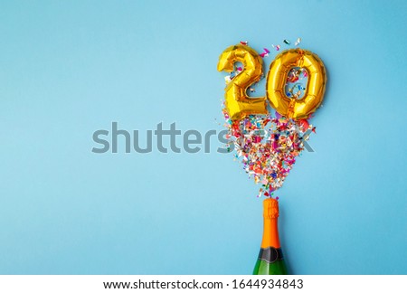 Similar – Image, Stock Photo Champagne bottle and confetti flow on pink