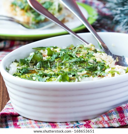 Rice casserole with egg, green spring onions, cilantro, soy,  chili, asian appetizer