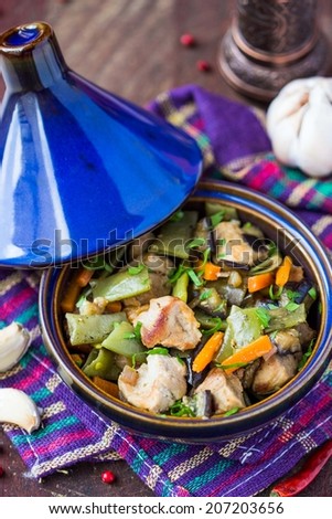 Oriental stew with meat, vegetables, green beans, carrot in tagine, tasty moroccan dish