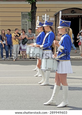 VORONEZH, RUSSIA - June 12, 2015: Line of drummer girls on the avenue. Parade of Street Theatres on the Platonov Arts Festival on June 12, 2015 in Voronezh, central Russia