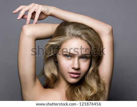 Natural portrait of a young blond girl