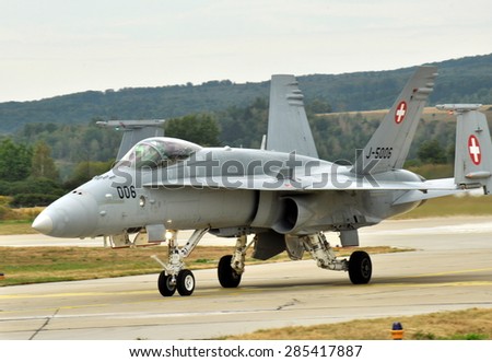 SLIAC, SLOVAK REPUBLIC - AUGUST 31 2012: F/A-18C (J-5006) Hornet Swiss Air Force with folded up wings after landing during the SIAF 2012 airshow