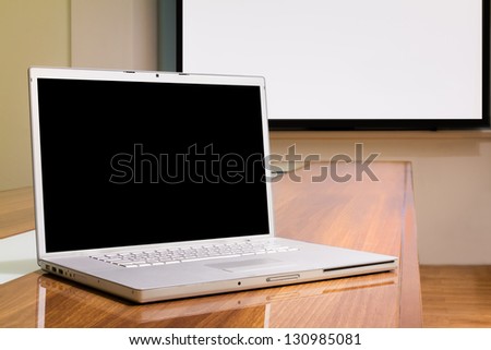 Blank screen laptop in conference room, meeting room, boardroom, Classroom, Office.