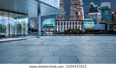 Empty square floor and modern city buildings in Shanghai at night, China. Stock foto © 