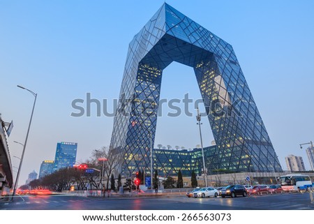 BEIJING, CHINA - On March 24? 2015: China Central Television (CCTV) Headquarters at dusk; it\'s a 234 m skyscraper. CCTV is the National TV station of China.