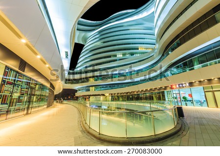 Beijing, China -March 22, 2015: Galaxy SOHO night scenery. It set business office in one, the construction by the world renowned architectural designer,pritzker prize winner zaha hadid design