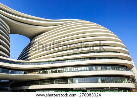 Beijing, China -March 22, 2015: Galaxy SOHO night scenery. It set business office in one, the construction by the world renowned architectural designer,pritzker prize winner zaha hadid design