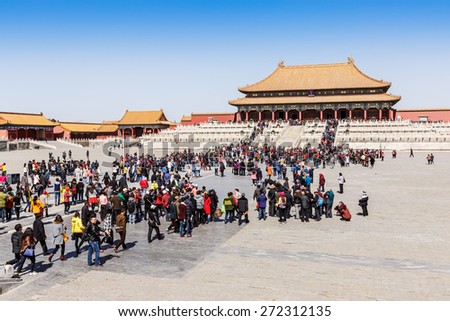 Beijing, China - March 27, 2015:tourists are visiting the Hall of Supreme Harmony in the Forbidden City. The Palace Museum was built in 1406-1420, served as imperial palace. UNESCO World Heritage.
