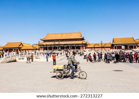 Beijing, China - on March 27, 2015: tourists are visiting the Hall of Supreme Harmony in the Forbidden City. The Palace Museum was built in 1406-1420, served as imperial palace. UNESCO World Heritage.