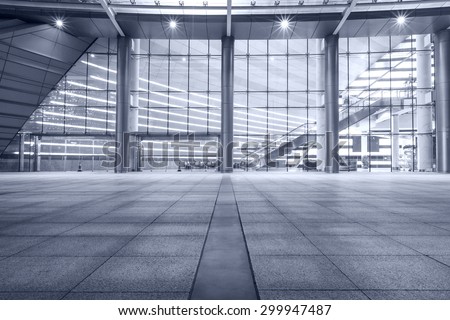 Empty walkway in front of the modern building