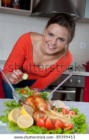 beautiful young woman in modern kitchen