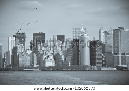 New York City - Lower Manhattan skyline  from Staten Island Ferry boat - split toned