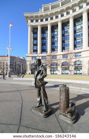 WASHINGTON, D.C. - JAN 20, 2013: Lone Sailor Statue at Navy Memorial which honors those who served in the Navy, Marine Corps, Coast Guard, and the Merchant Marine.