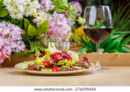 Salad with vegetables, fruits and meet