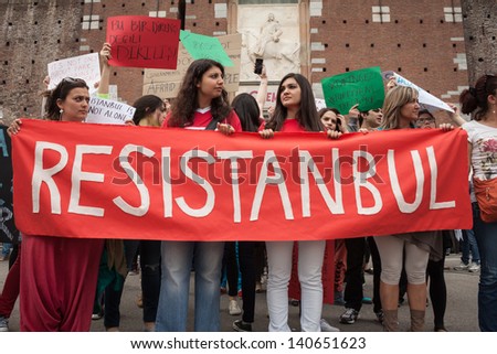 MILAN, ITALY - JUNE 1: Turkish people during a protest march in Milan JUNE 1, 2013. Turkish people protest against prime minister Erdogan for the violent attacks by riot police at Gezi Park (Istanbul)