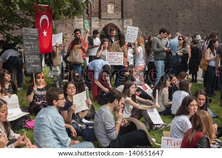 MILAN, ITALY - JUNE 1: Turkish people during a protest march in Milan JUNE 1, 2013. Turkish people protest against prime minister Erdogan for the violent attacks by riot police at Gezi Park (Istanbul)