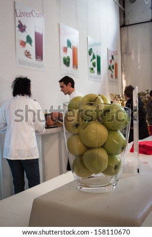MILAN, ITALY - OCTOBER 11: Fruit juice bar at Yoga Festival 2013, event dedicated to yoga, meditation and healthy lifestyle on OCTOBER 11, 2013 in Milan.
