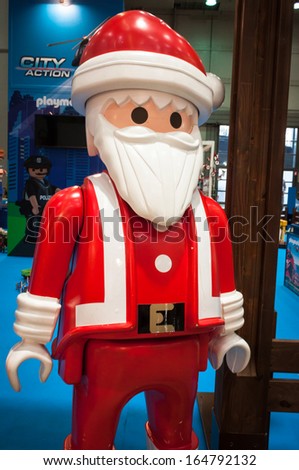 MILAN, ITALY - NOVEMBER 22: Playmobil Santa at G! come giocare, trade fair dedicated to games, toys and children on NOVEMBER 22, 2013 in Milan.