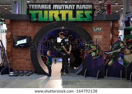 MILAN, ITALY - NOVEMBER 22: Ninja turtles stand at G! come giocare, trade fair dedicated to games, toys and children on NOVEMBER 22, 2013 in Milan.