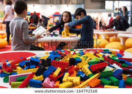 MILAN, ITALY - NOVEMBER 22: Detail of Lego building bricks at G! come giocare, trade fair dedicated to games, toys and children on NOVEMBER 22, 2013 in Milan.