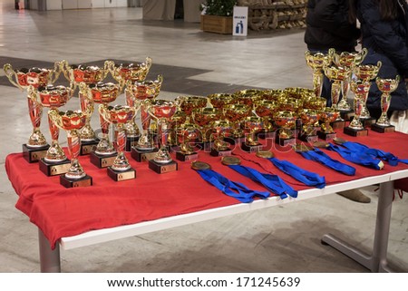MILAN, ITALY - JANUARY 11: Detail of cups and medals at the international dogs exhibition of Milan, the most important dog show in Italy, on JANUARY 11, 2014 in Milan.