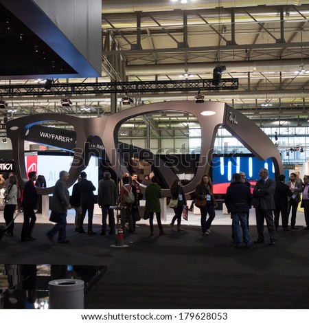 MILAN, ITALY - MARCH 1: People visit Mido, international exhibition for optics, optometry and ophthalmology on MARCH 1, 2014 in Milan.