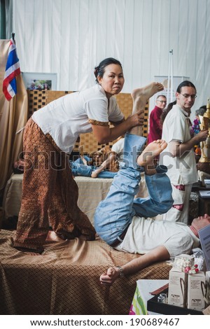 MILAN, ITALY - APRIL 27: Thai massage at Orient Festival, event dedicated to Oriental culture and traditions on APRIL 27, 2014 in Milan.