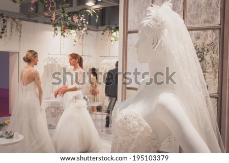 MILAN, ITALY - MAY 23: Wedding dress on display at Si\' Sposaitalia, ultimate exhibition for bridal and formal wear industry on MAY 23, 2014 in Milan.