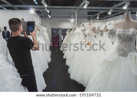 MILAN, ITALY - MAY 23: Wedding dresses on display at Si\' Sposaitalia, ultimate exhibition for bridal and formal wear industry on MAY 23, 2014 in Milan.