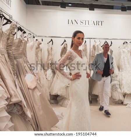 MILAN, ITALY - MAY 23: Model poses at Si\' Sposaitalia, ultimate exhibition for bridal and formal wear industry on MAY 23, 2014 in Milan.